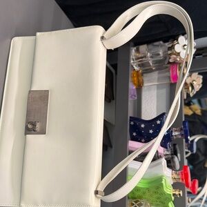 Chic and classy white Ferraragamo shoulder/ handbag